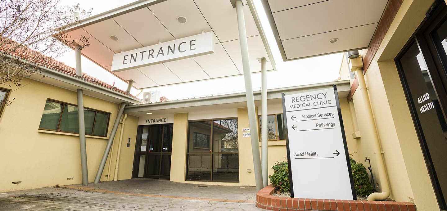 The clinic's entrance on Regency Road, with its sign pointing to medical services, pathology and allied health